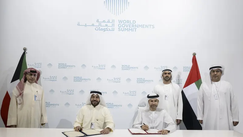 أثناء توقيع اتفاقية منع الازدواج الضريبي بين الكويت والإمارات